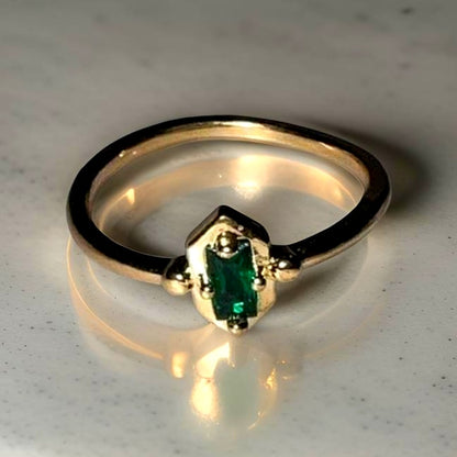 Emerald Cut Green Pronged Gold Ring